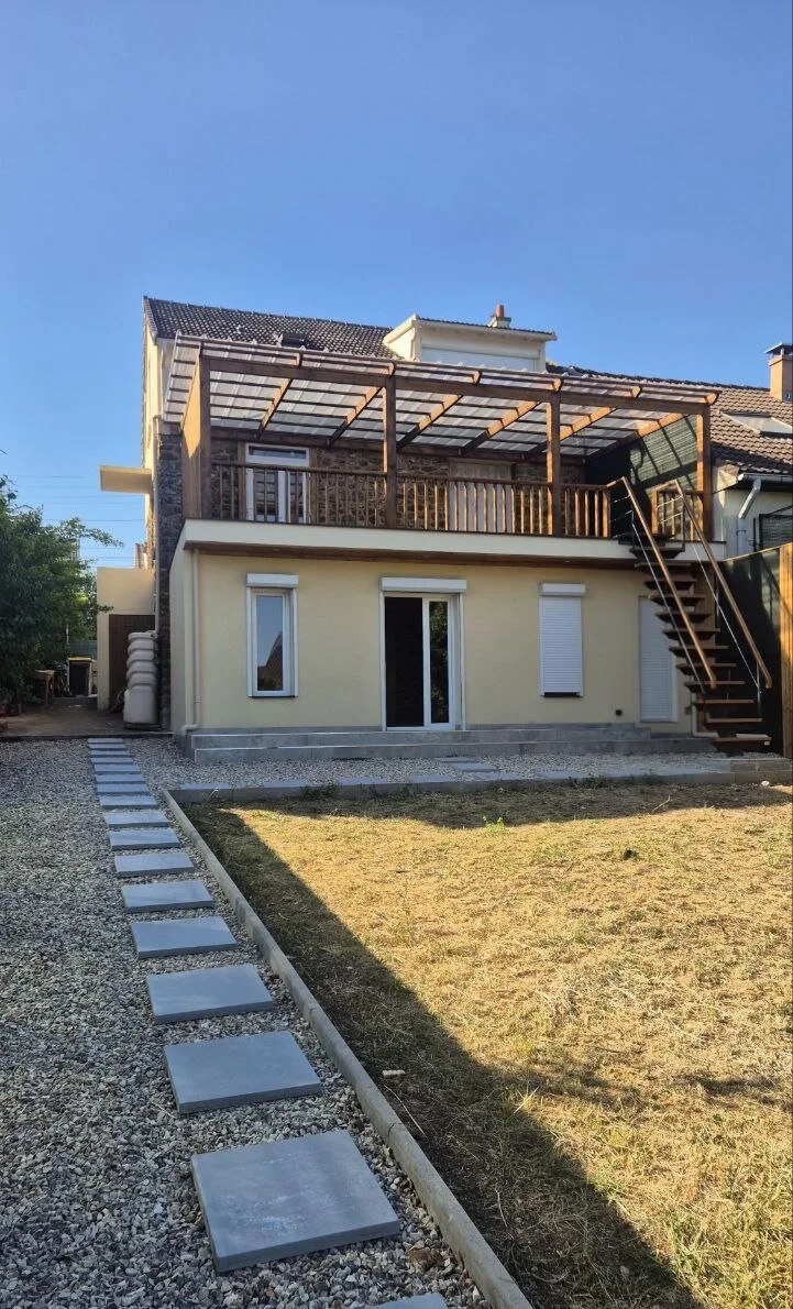 Extension d’une maison avec terrasse